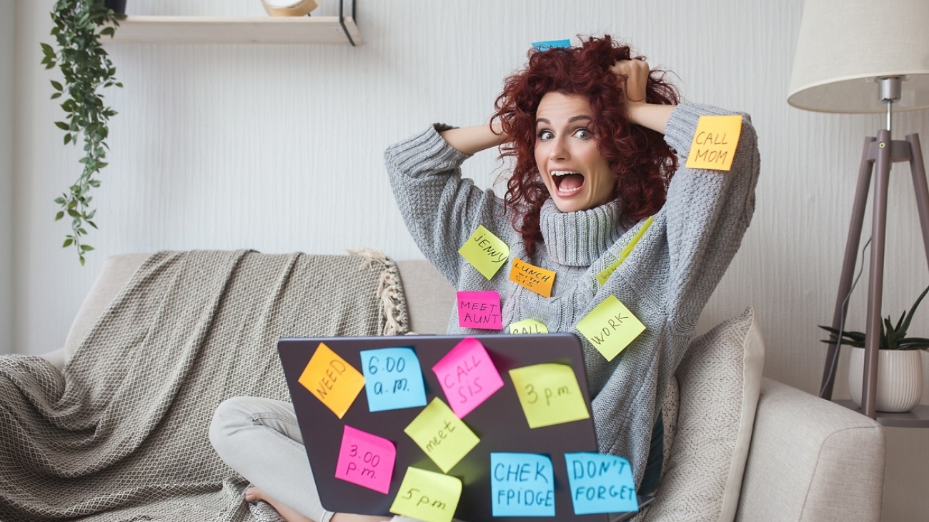 Very busy lady.Overworked woman with many tasks to do. Female have a lot to do. Business woman stressed.